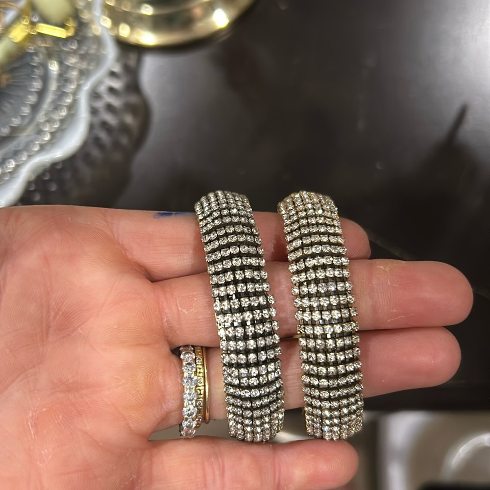 Bangle J. Crew cuff bracelets, diamonds and black/gold background. Size small.